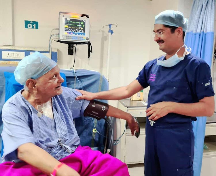 Dr. Nisarga consulting with a patient
