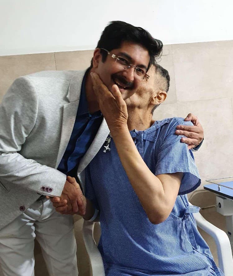 Dr. Nisarga examining a patient